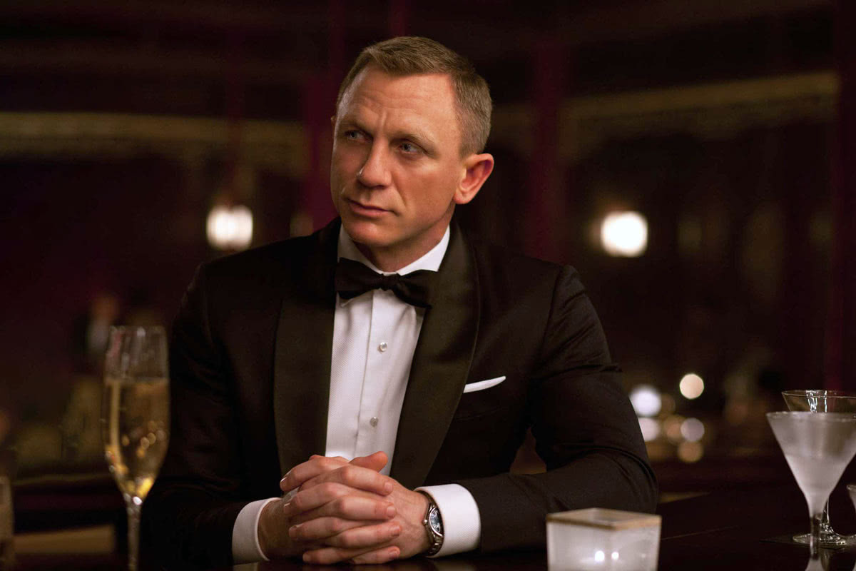James Bond cocktail attire champagne luxury - Luxe Digital