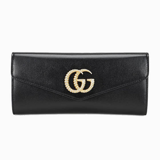 Gucci Broadway leather clutch best luxury brands - Luxe Digital