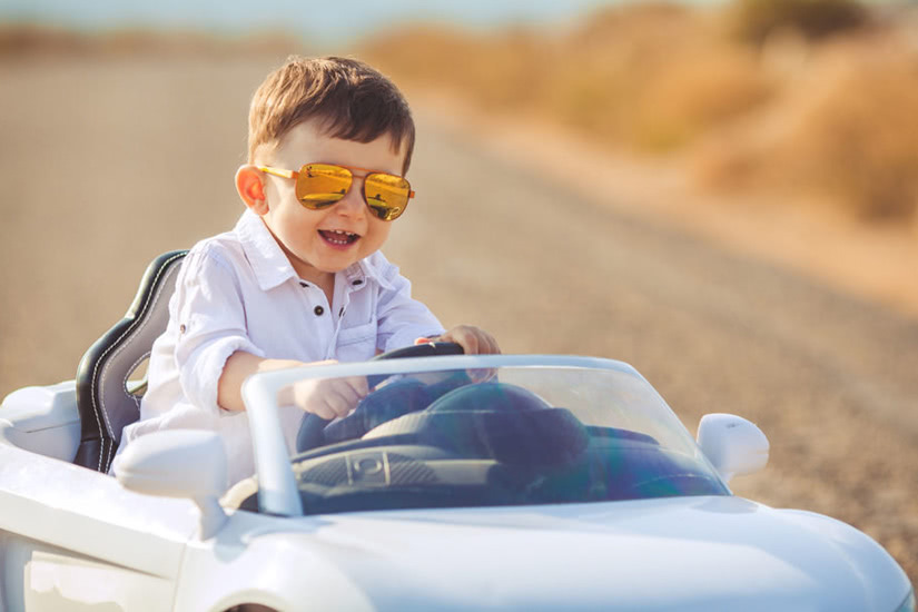 kids driving electric cars