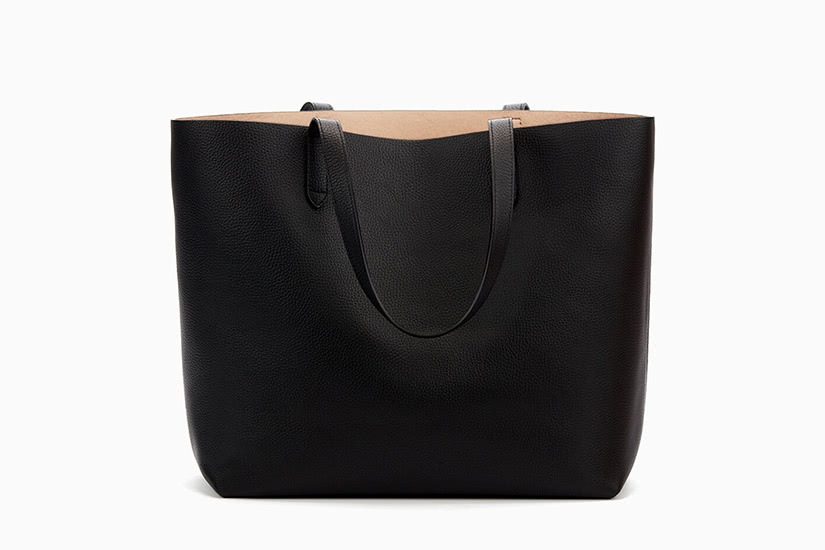 designer bags that fit a laptop