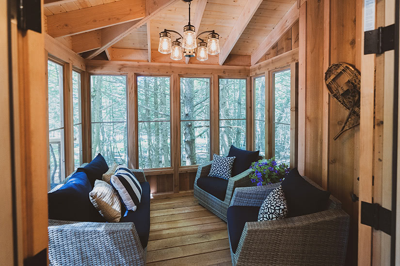 the woods maine treehouse porch luxury - Luxe Digital