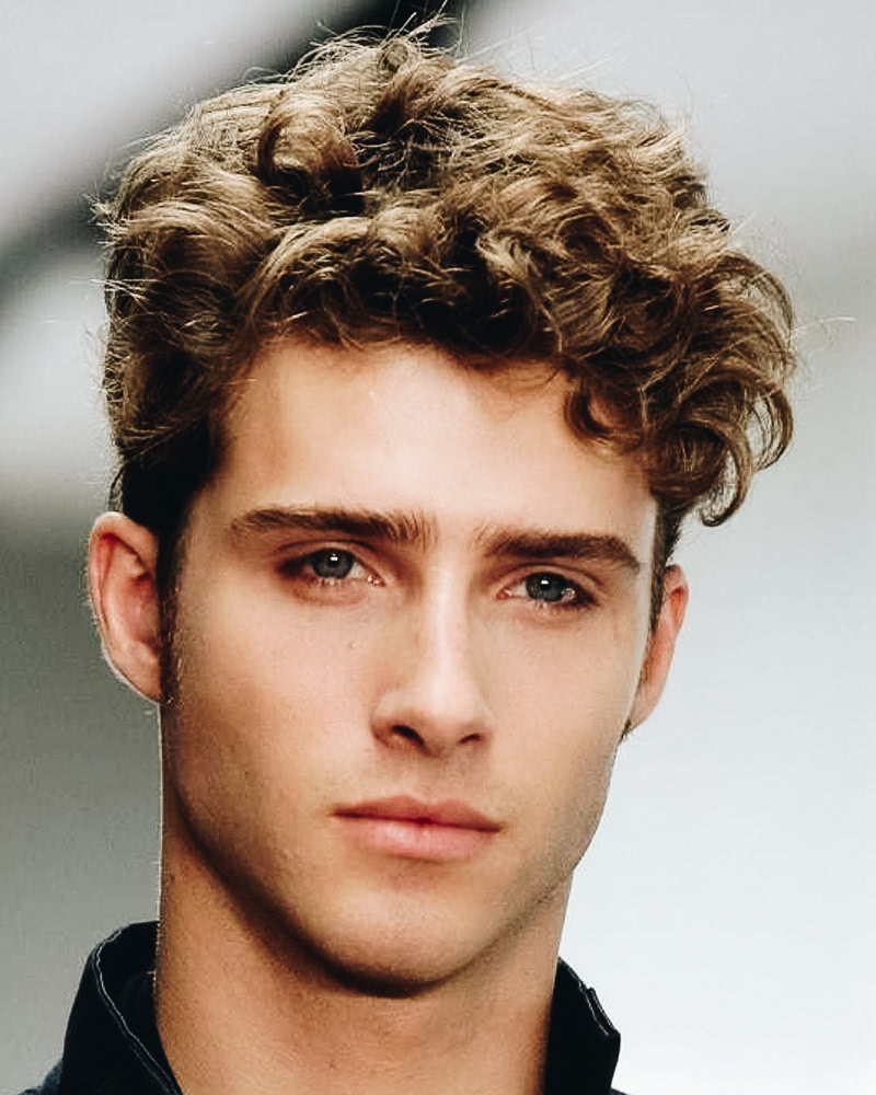 best short haircuts men curly quiff - Luxe Digital