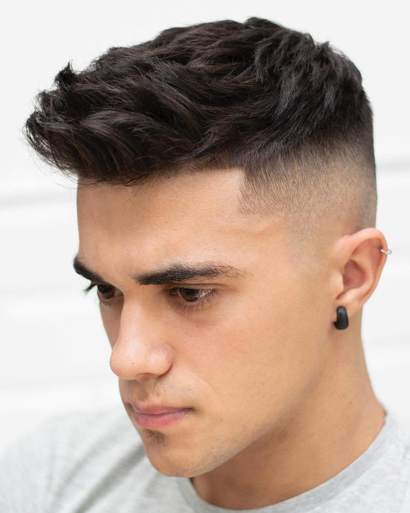 men fade haircuts low taper fade with textured top Luxe Digital