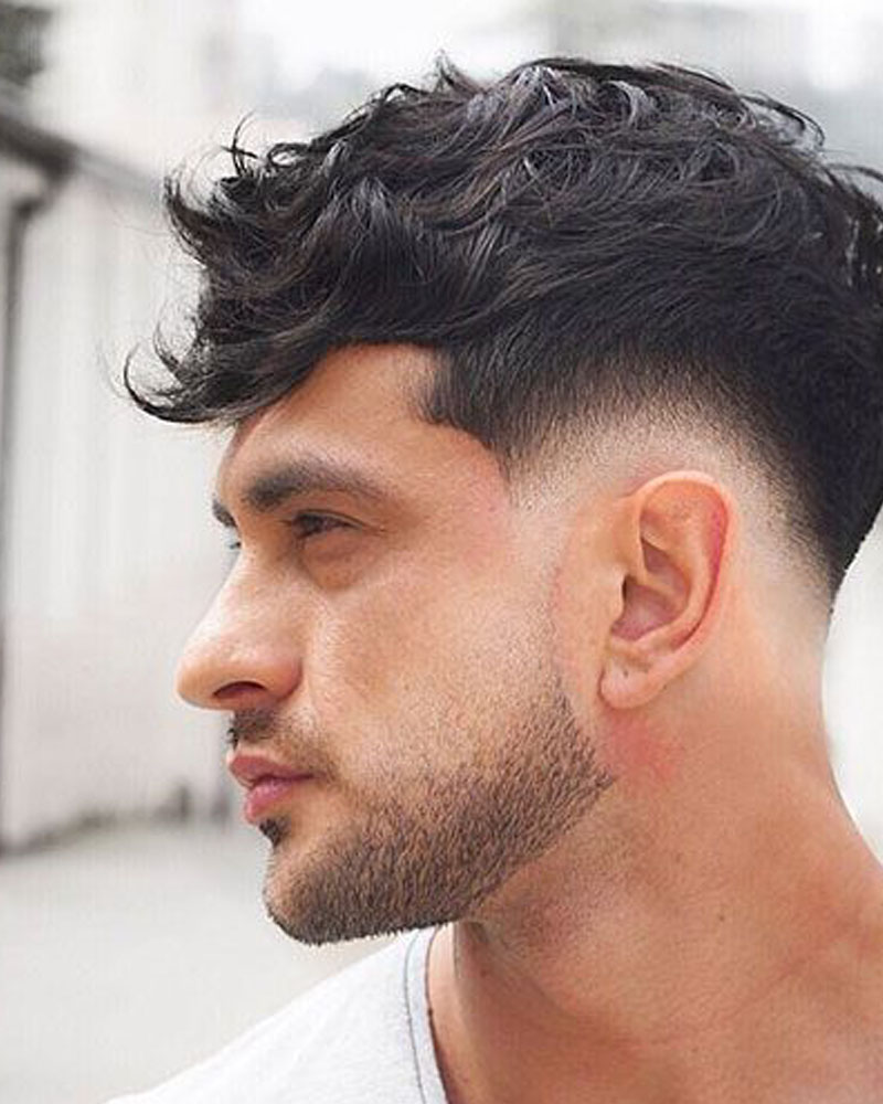 men fade haircuts low taper fade with textured top Luxe Digital