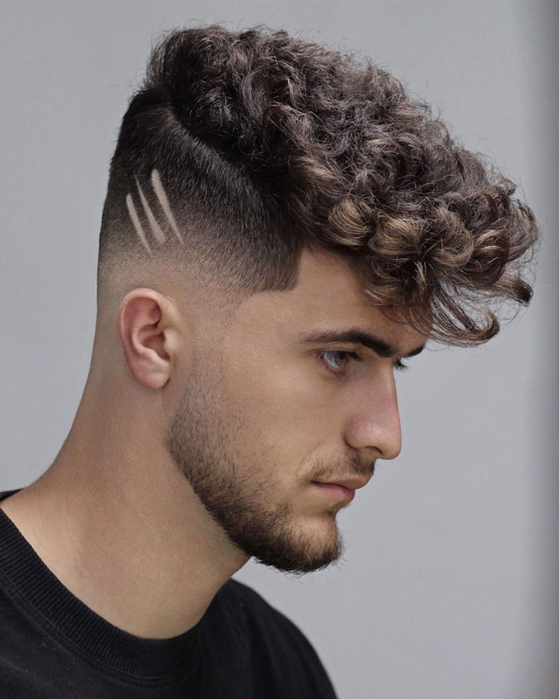 taper fade curly faux hawk