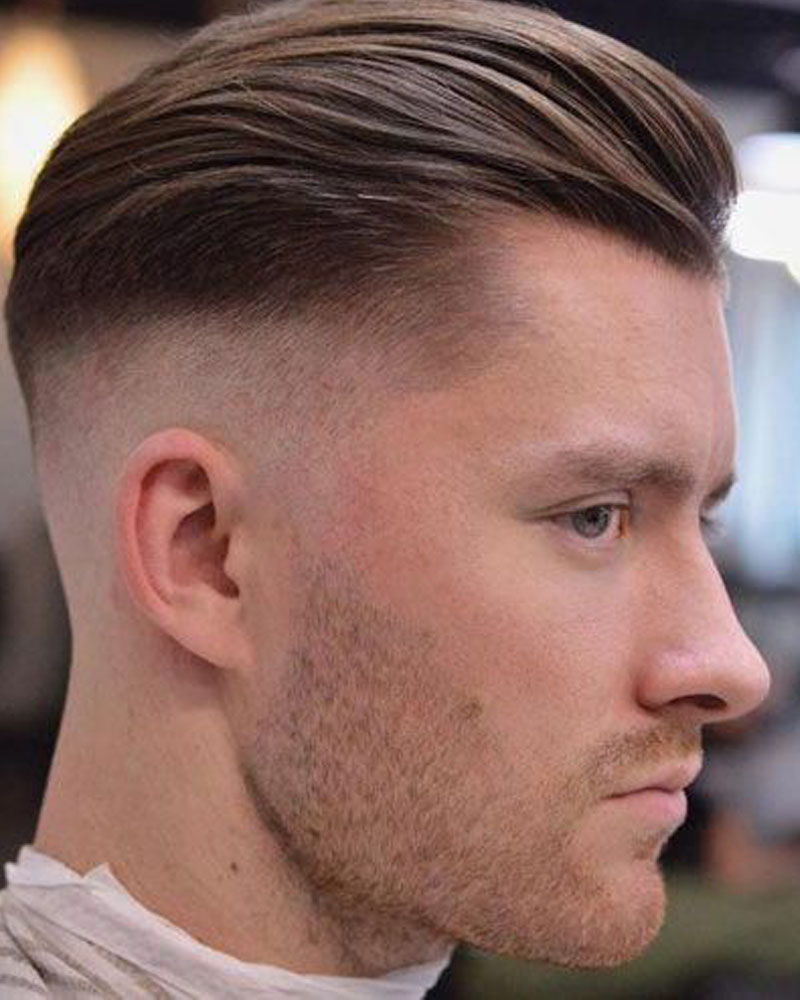 men fade haircuts slicked back hair with medium fade Luxe Digital