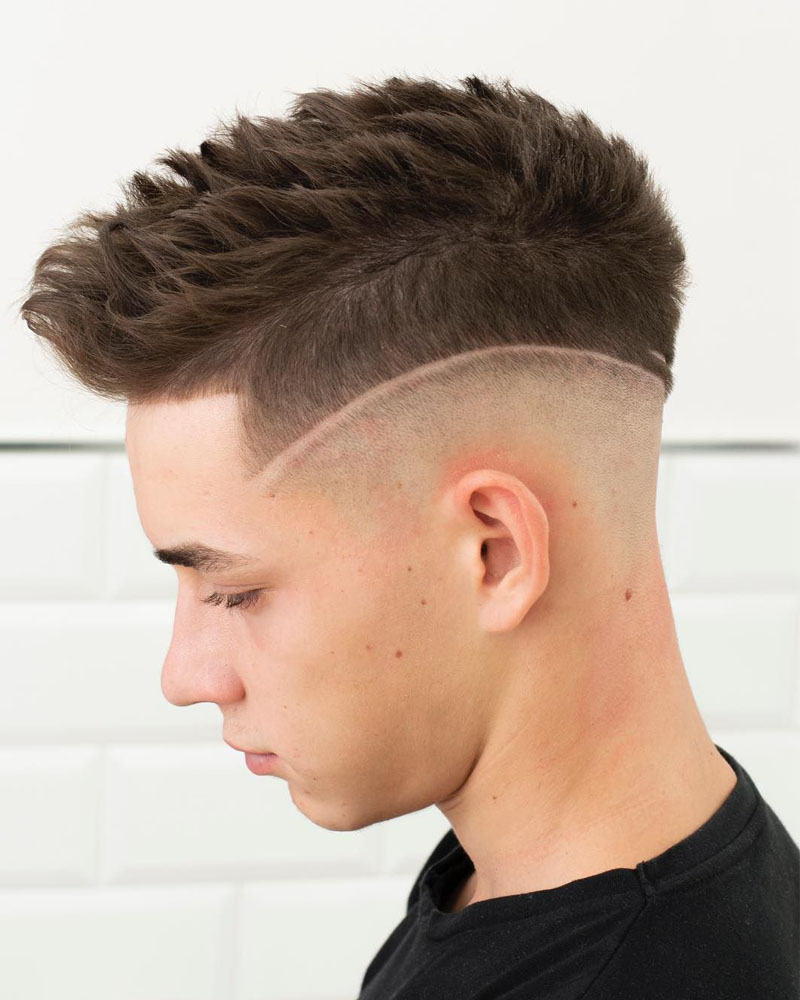 men fade haircuts undercut fade with hard part and textured spikes Luxe Digital