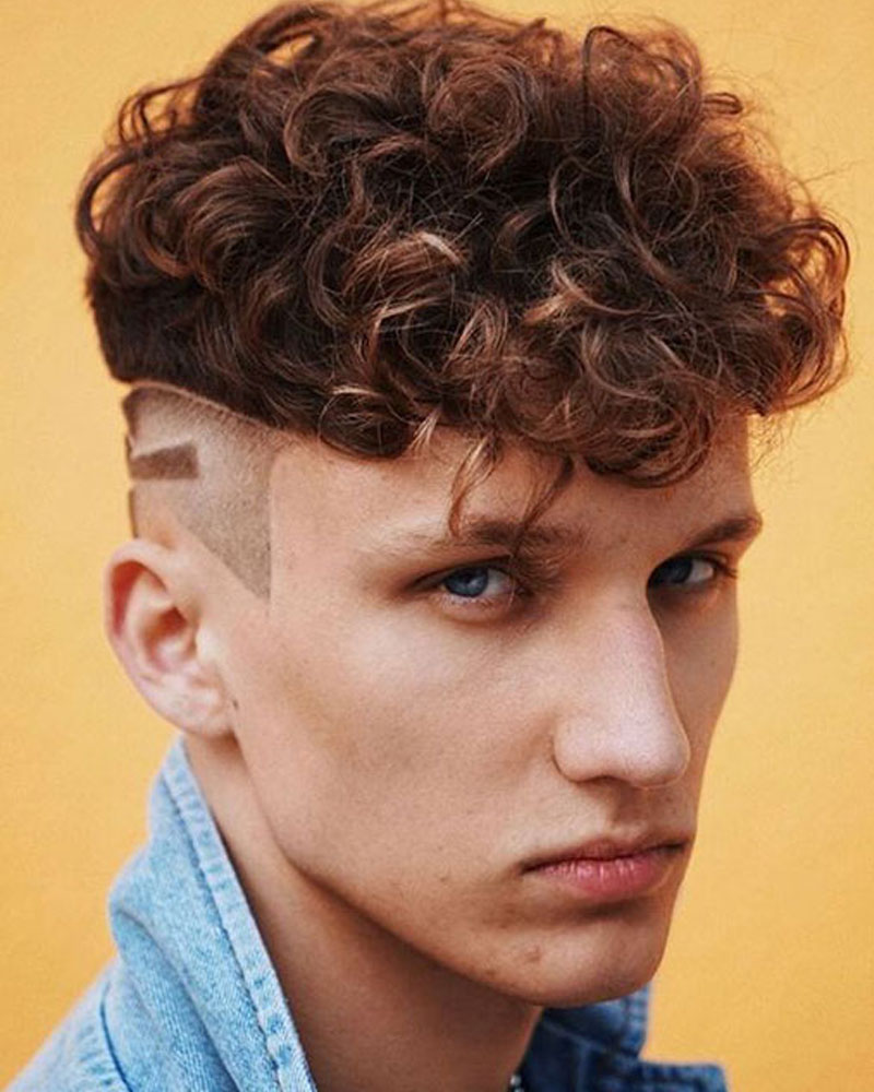 men curly hairstyles modern curly hair with tapered undercut Luxe Digital