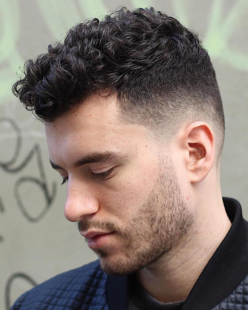 men curly hairstyles gradual fade with styled curls Luxe Digital