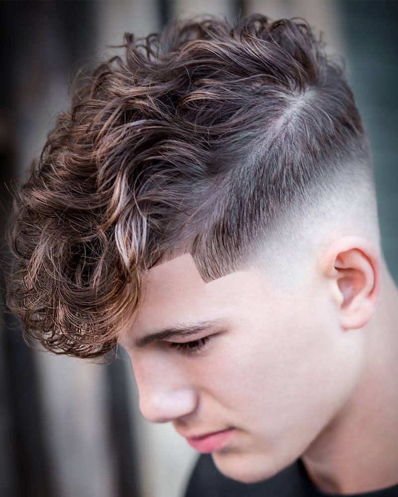 men curly hairstyles curly top with sharp low fade Luxe Digital