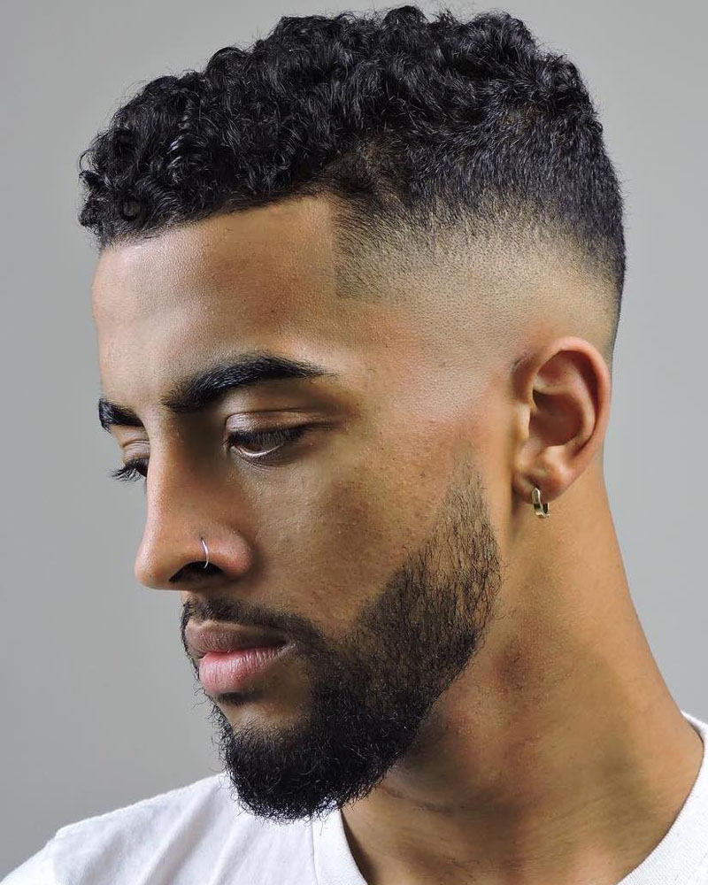 men curly hairstyles intense short curls with crystal mid fade Luxe Digital