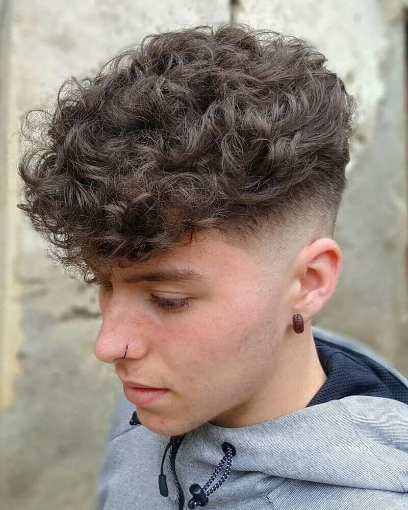 men curly hairstyles medium fade and curly top Luxe Digital