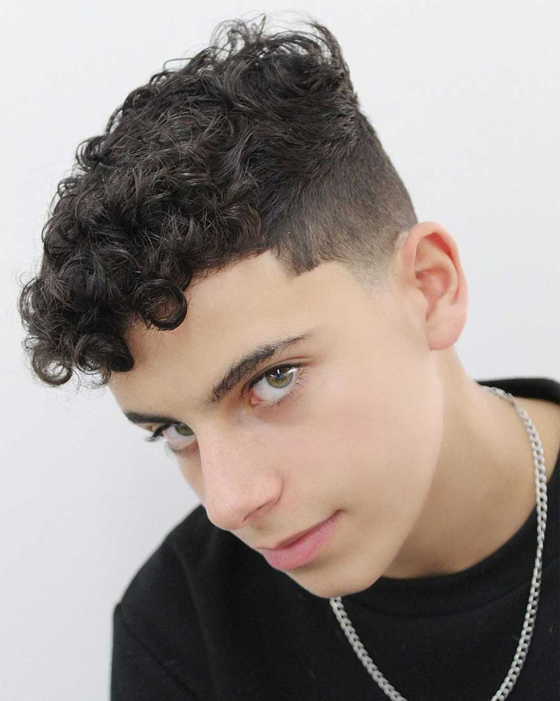 men curly hairstyles front curls with side fade Luxe Digital