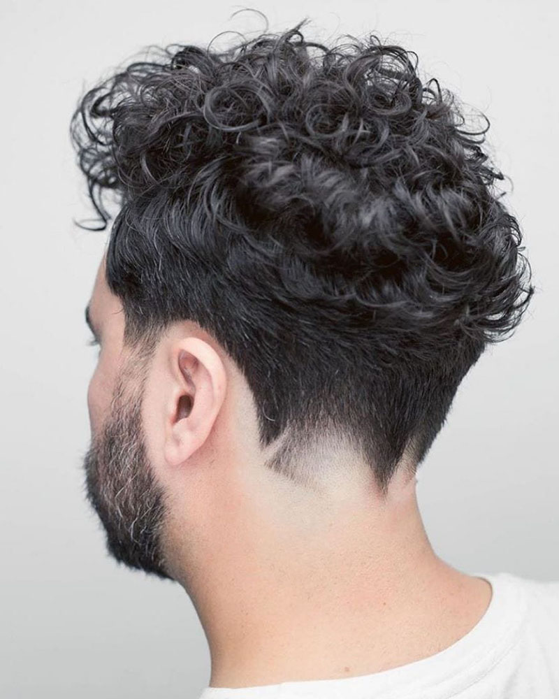 men curly hairstyles dense curls with fancy neckline Luxe Digital