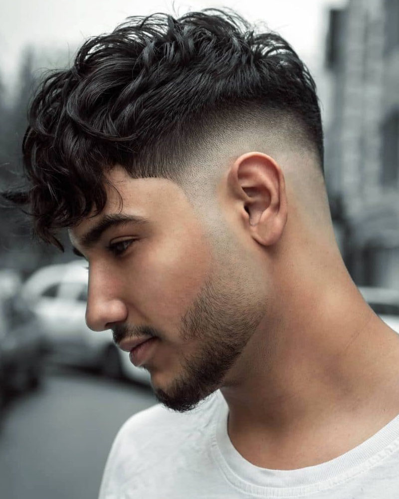 taper fade haircuts men wavy top with mild line up Luxe Digital