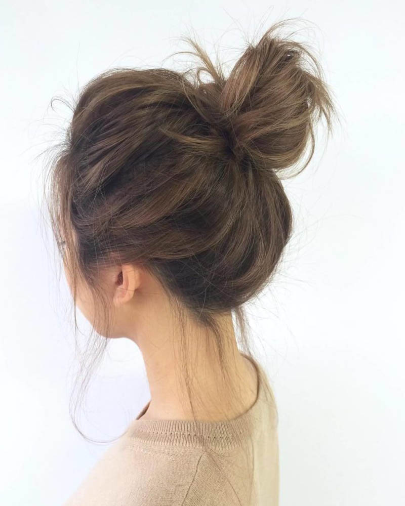 medium length hairstyles women shoulder length hair with messy bun Luxe Digital