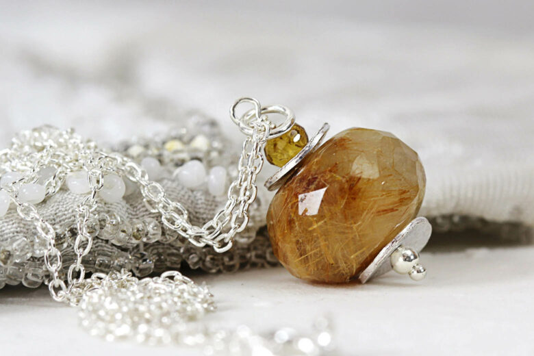 rutilated quartz meaning properties value family - Luxe Digital