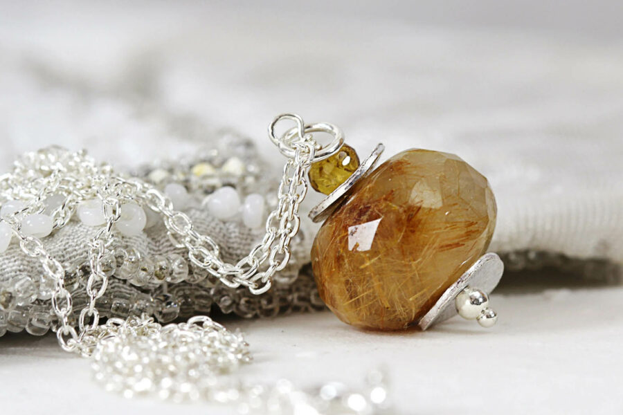 Rutilated Quartz Stone: Its Meaning, Properties & Value