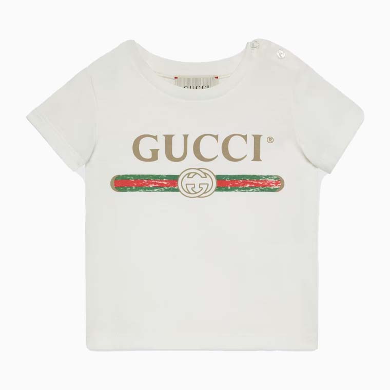 best luxury gift guide kids ideas gucci baby t shirt with gucci logo - Luxe Digital