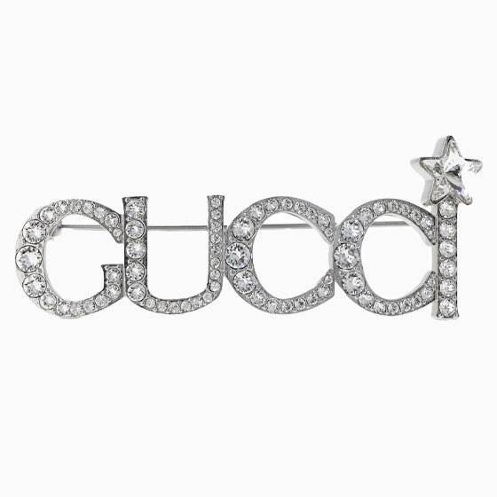 luisaviaroma party outfit women gucci script brass brooch - Luxe Digital