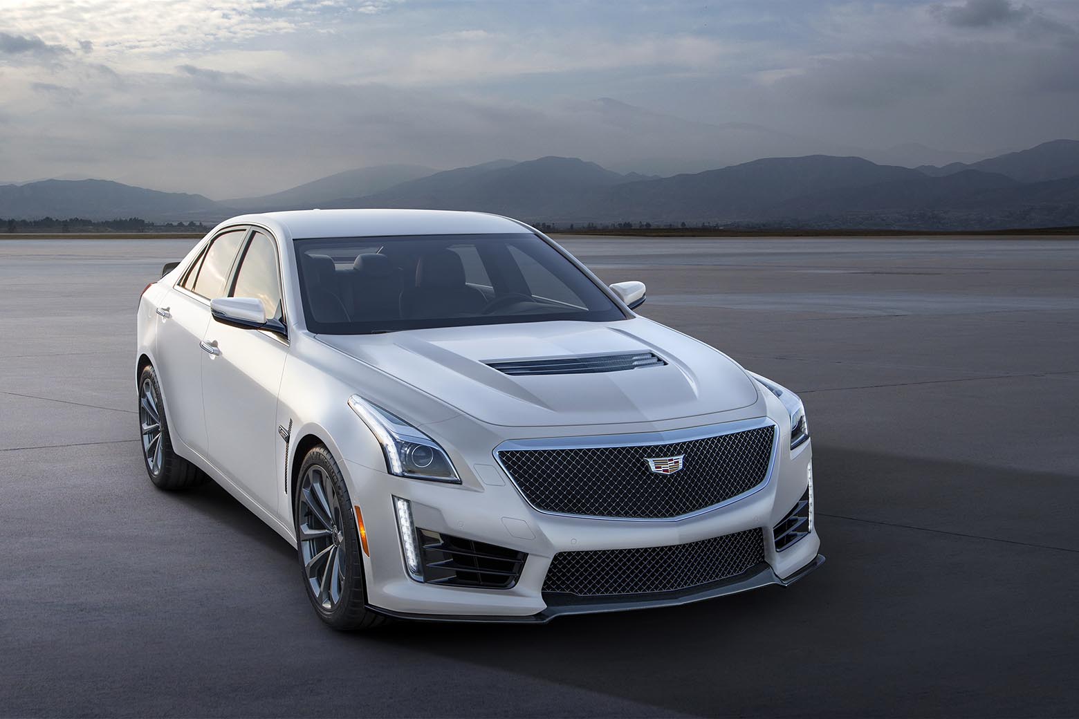 Cadillac car and suv list price reviews and specs