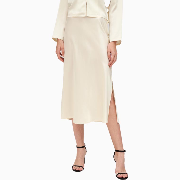 women cocktail attire guide lilysilk minimalist aesthetic silk poppy skirt - Luxe Digital