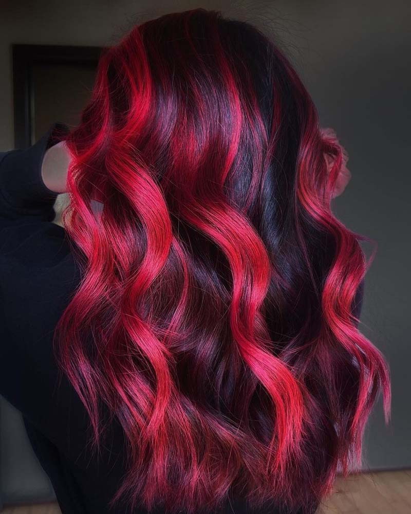 black hair with pastel red highlights - Luxe Digital
