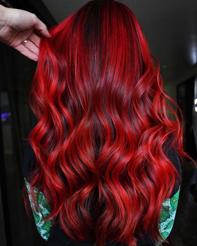 black hair highlights fiery red highlights on jet black base - Luxe Digital