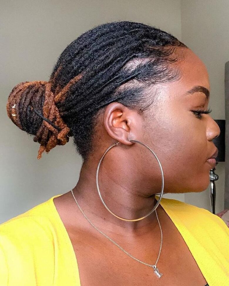 women dreadlock hairstyles afro dreads in a low bun - Luxe Digital