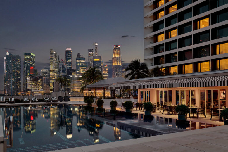 mandarin oriental singapore review swimming pool night luxe digital
